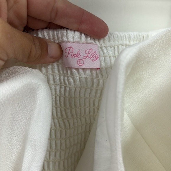 Strapless bow top size large has boning - Picture 2 of 3